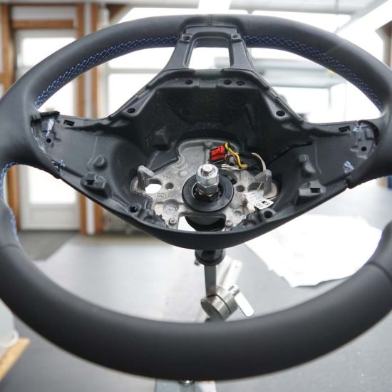Leather upholstery steering wheel